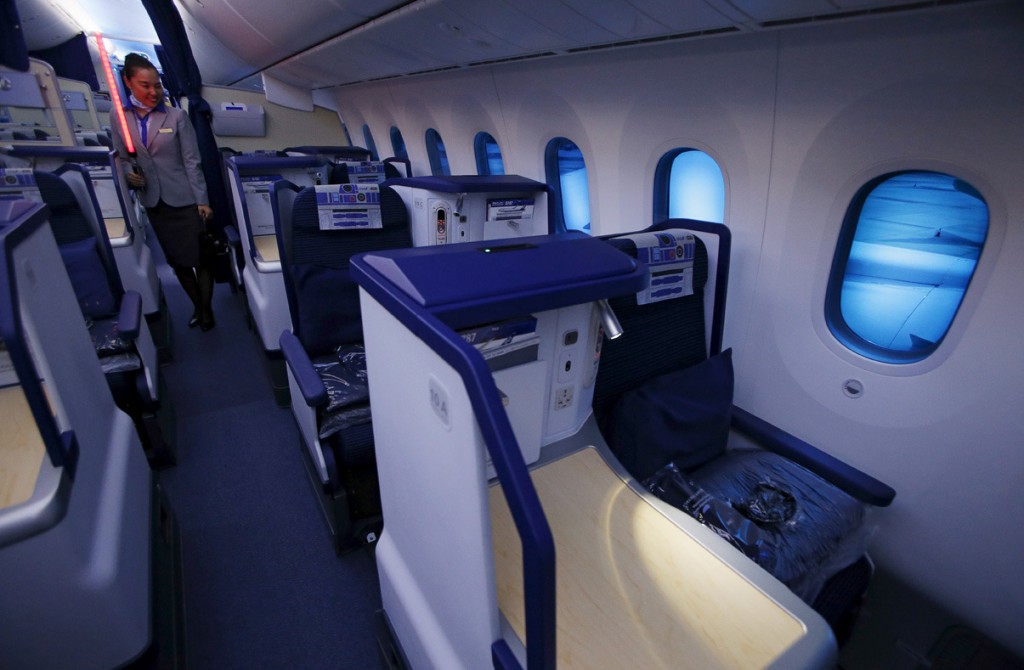 Image #: 40769521    A stewardess holds a lightsabre during a media tour of the Star Wars themed All Nippon Airways ANA R2D2 Boeing 787 Dreamliner aircraft at Singapore's Changi Airport November 12, 2015. The aircraft was opened to the media on Thursday as it makes its first Asian stop outside Japan. REUTERS/Edgar Su  /LANDOV